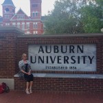 Sue at Auburn University sign