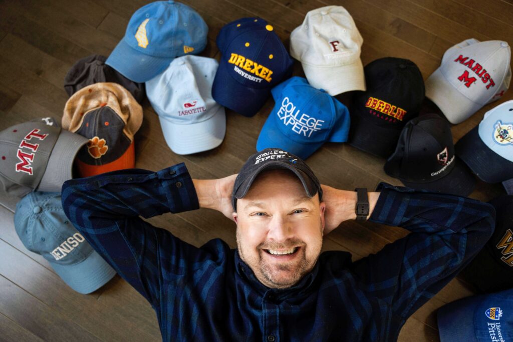 Ryan Luse with his hat collection