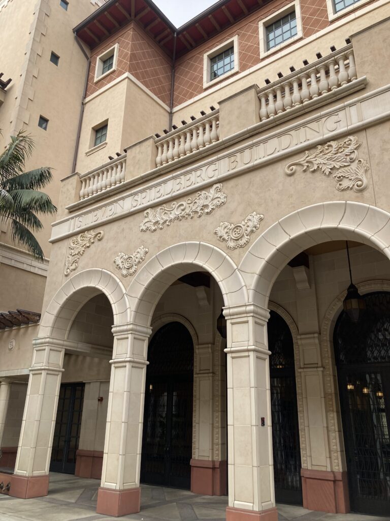 Three ornate stone arches on Steven Spielberg Building